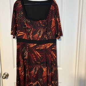 Chic Black and Orange Patterned Midi Dress